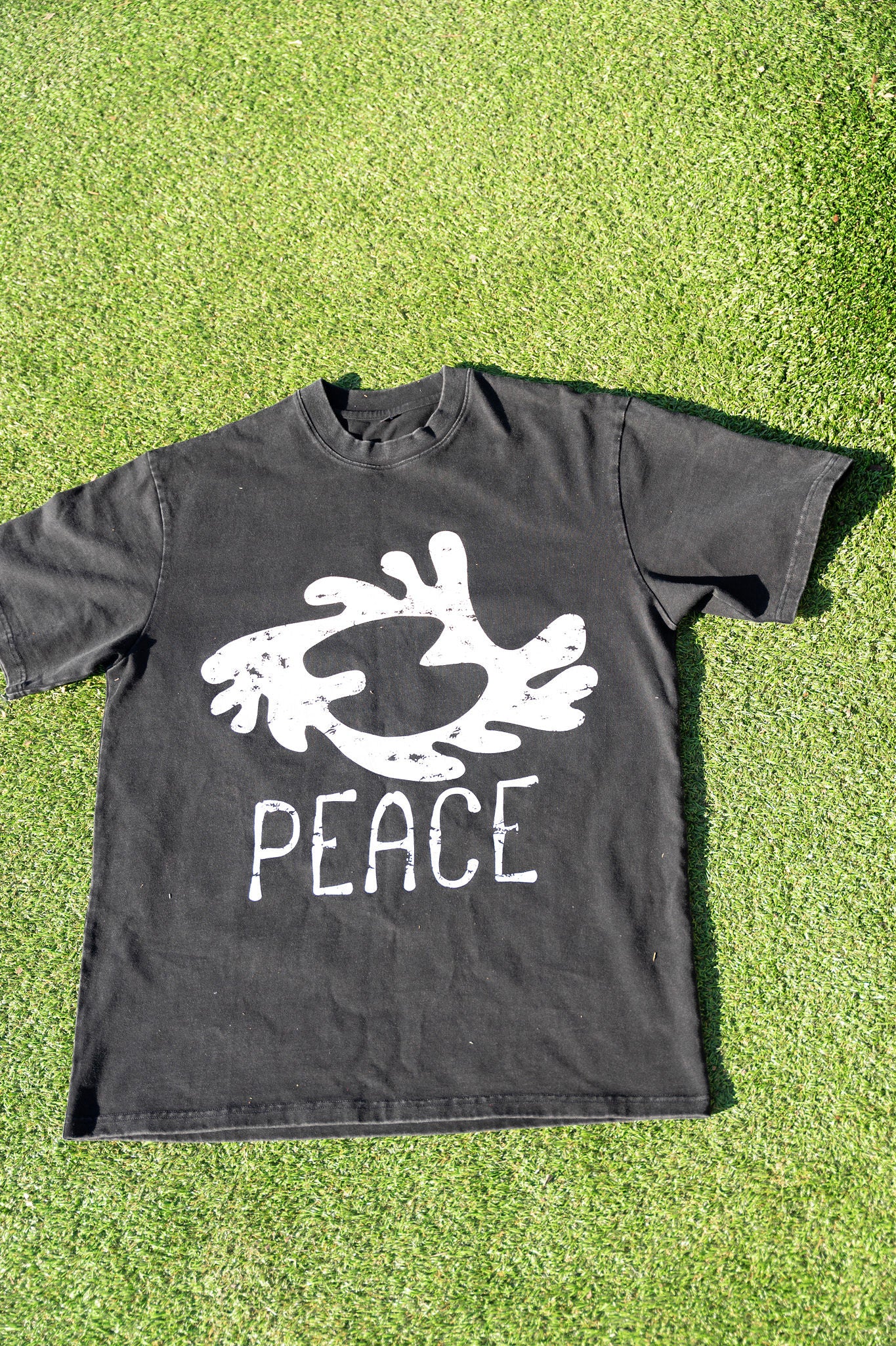 Amani "World Piece" Graphic Tee