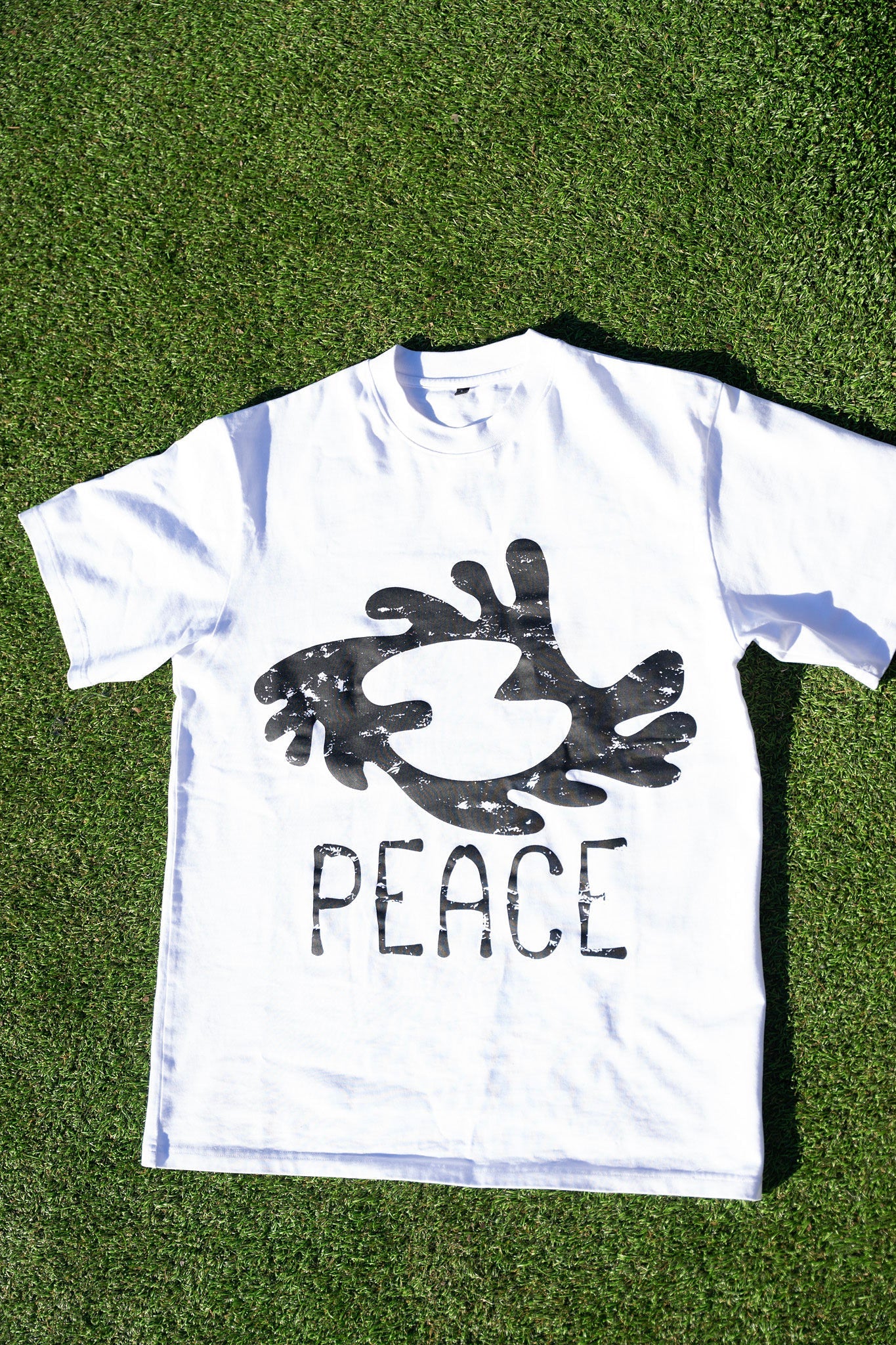 Amani "World Peace" Graphic Tee